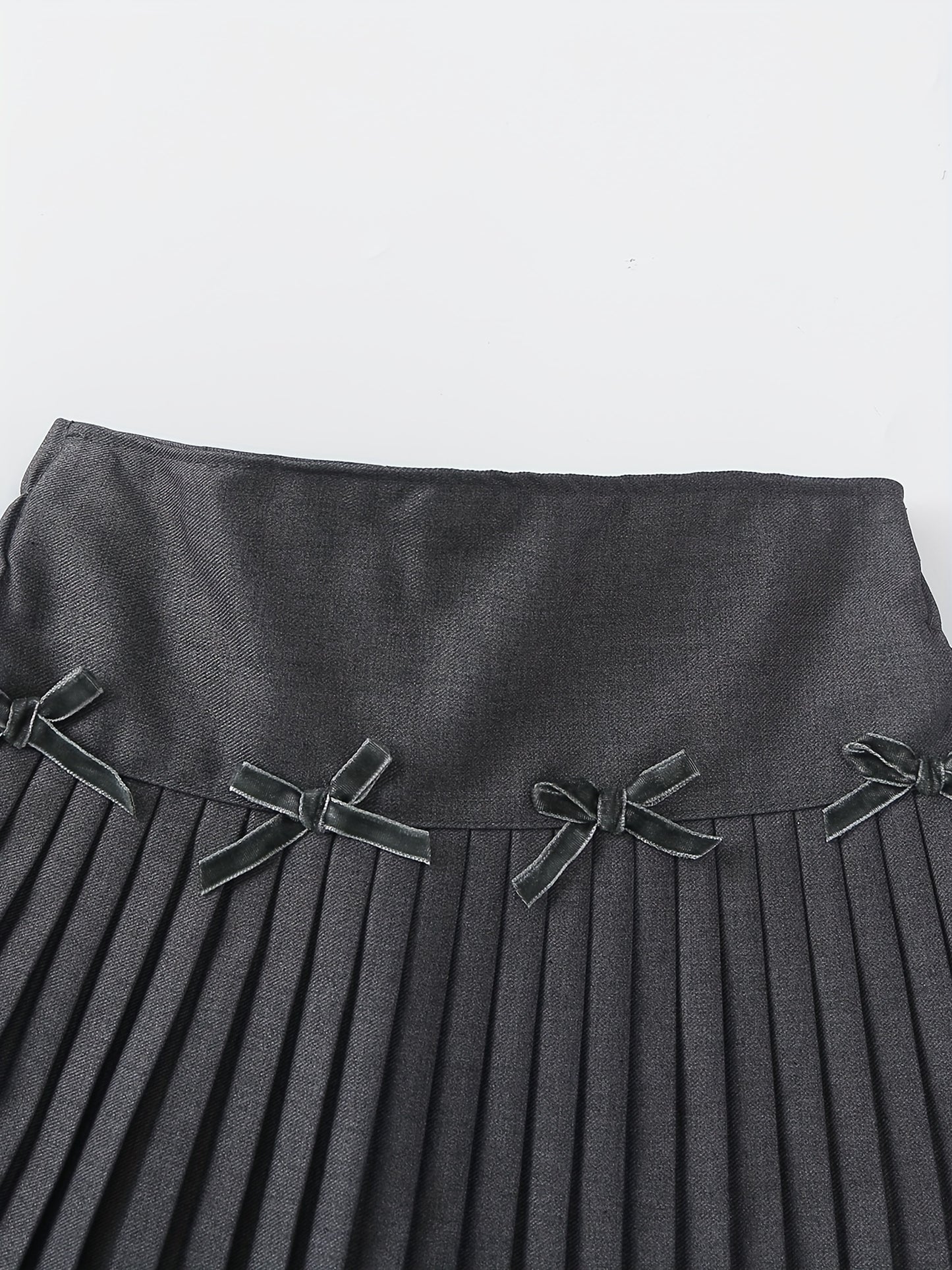 Girls Pleated Mini Skirt - Chic Black Bow-Knot Design, Classic Preppy Style, Solid High Waist, Built-in Safety Shorts, Flattering Mini Length